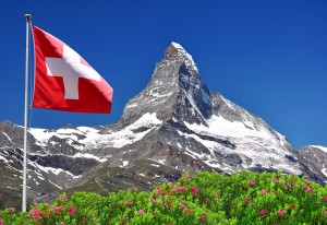 Beautiful mountain Matterhorn with Swiss flag - Swiss Alps