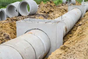 Concrete drainage pipe and manhole under construction