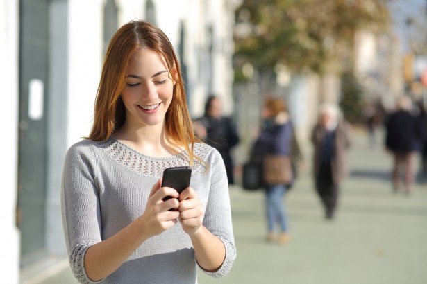 Teen with iPhone